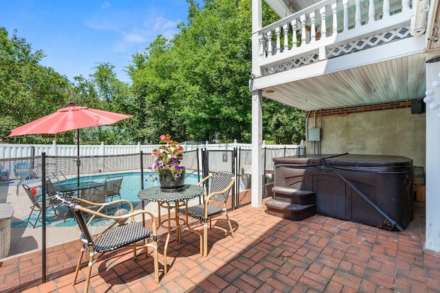 605 Jackson Ave, Carthage, TN 37030 - fenced backyard featuring a hot tub and a patio area