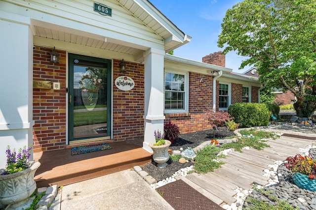 605 Jackson Ave, Carthage, TN 37030 - doorway to property featuring brick siding and a chimney