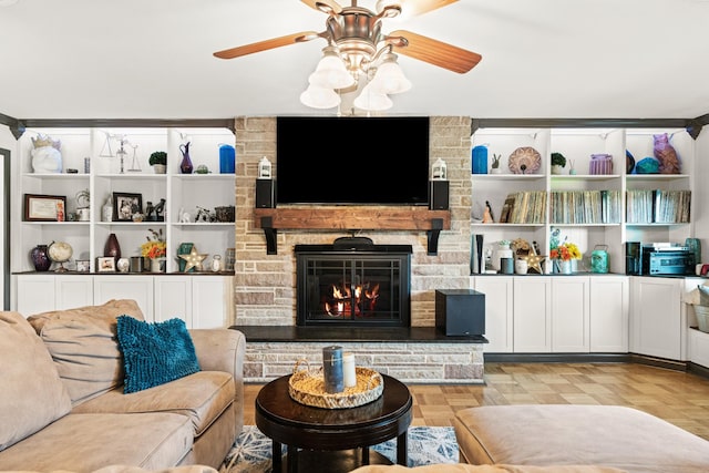 605 Jackson Ave, Carthage, TN 37030 - living area featuring a ceiling fan and a stone fireplace