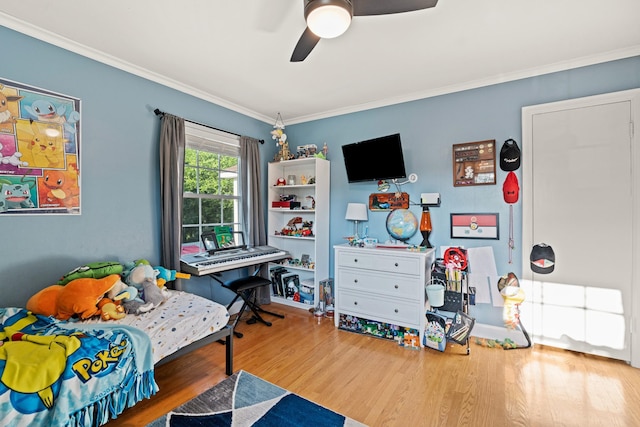 605 Jackson Ave, Carthage, TN 37030 - bedroom with wood finished floors, crown molding, and a ceiling fan