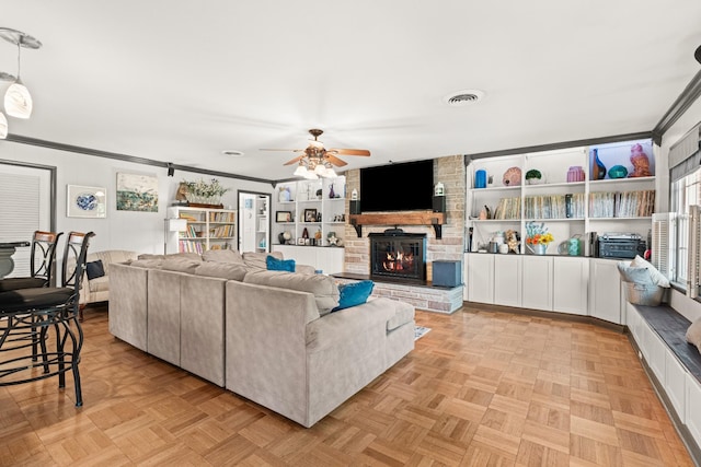 605 Jackson Ave, Carthage, TN 37030 - living area with ceiling fan, a fireplace, and crown molding