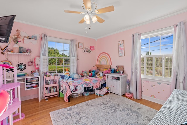 605 Jackson Ave, Carthage, TN 37030 - bedroom with wood finished floors, ornamental molding, and ceiling fan