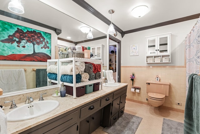 605 Jackson Ave, Carthage, TN 37030 - bathroom with tile walls, ornamental molding, double vanity, tile patterned flooring, and wainscoting