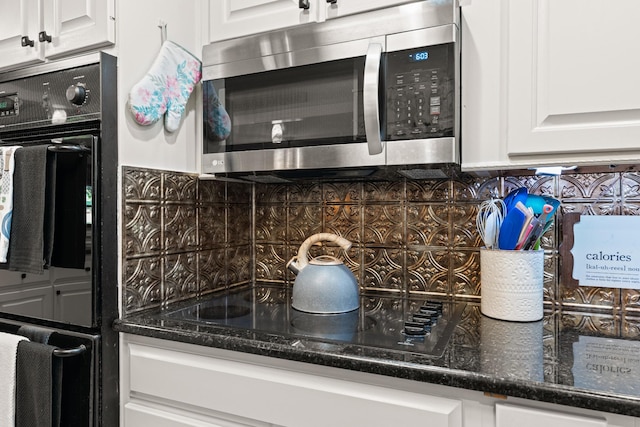 605 Jackson Ave, Carthage, TN 37030 - kitchen featuring black appliances, tasteful backsplash, white cabinets, and dark stone countertops