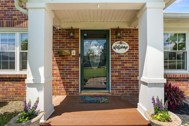 605 Jackson Ave, Carthage, TN 37030 - doorway to property with a porch and brick siding