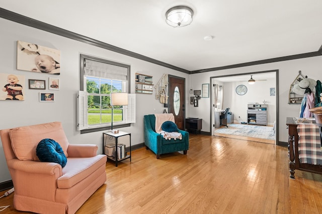 605 Jackson Ave, Carthage, TN 37030 - living area with ornamental molding and light wood finished floors