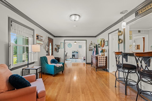 605 Jackson Ave, Carthage, TN 37030 - living area with light wood-style floors and ornamental molding