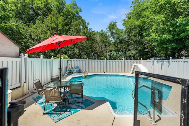 605 Jackson Ave, Carthage, TN 37030 - view of swimming pool featuring a fenced backyard, a patio area, and view of wooded area