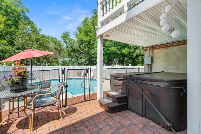 605 Jackson Ave, Carthage, TN 37030 - fenced backyard featuring a hot tub and a patio area