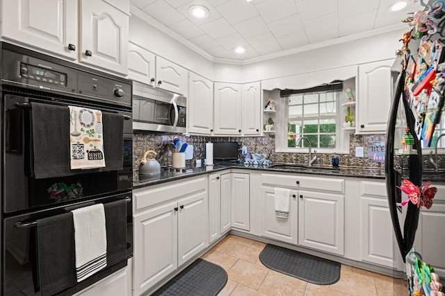 605 Jackson Ave, Carthage, TN 37030 - kitchen with black appliances, white cabinetry, open shelves, ornamental molding, and backsplash