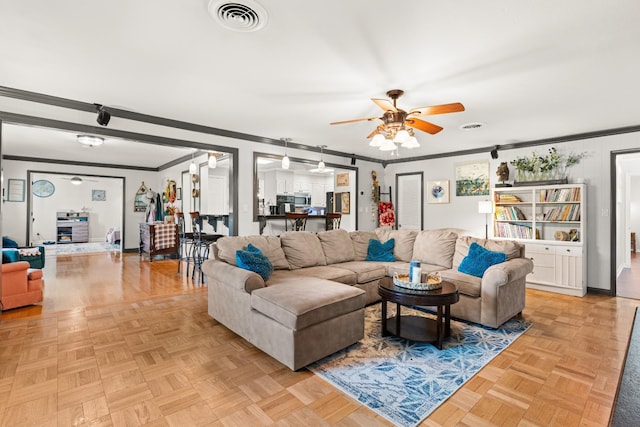 605 Jackson Ave, Carthage, TN 37030 - living area with ornamental molding and ceiling fan