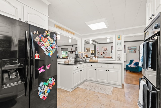 605 Jackson Ave, Carthage, TN 37030 - kitchen with black refrigerator with ice dispenser, crown molding, white cabinetry, double oven, and a peninsula