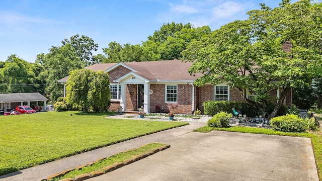 605 Jackson Ave, Carthage, TN 37030 - view of front of property featuring brick siding and a front yard
