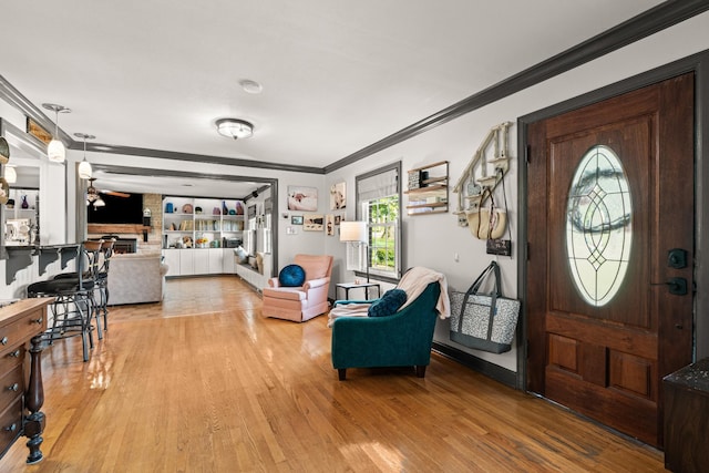 605 Jackson Ave, Carthage, TN 37030 - entryway featuring crown molding, light wood finished floors, and a ceiling fan