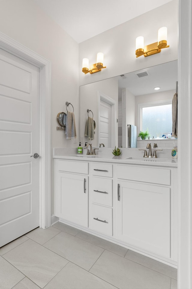 1588 Cobbler Ct, Chattanooga, TN 37421 - bathroom featuring double vanity and tile patterned flooring