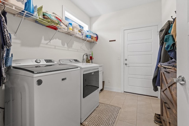 1588 Cobbler Ct, Chattanooga, TN 37421 - laundry area with washer and clothes dryer and light tile patterned floors