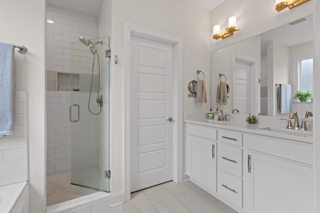 1588 Cobbler Ct, Chattanooga, TN 37421 - bathroom featuring a shower stall, tile patterned floors, and double vanity