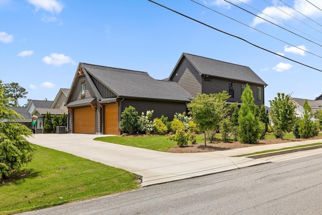 1588 Cobbler Ct, Chattanooga, TN 37421 - view of front facade with concrete driveway, a front lawn, and an attached garage