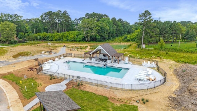 1588 Cobbler Ct, Chattanooga, TN 37421 - community pool featuring a patio and a forest view