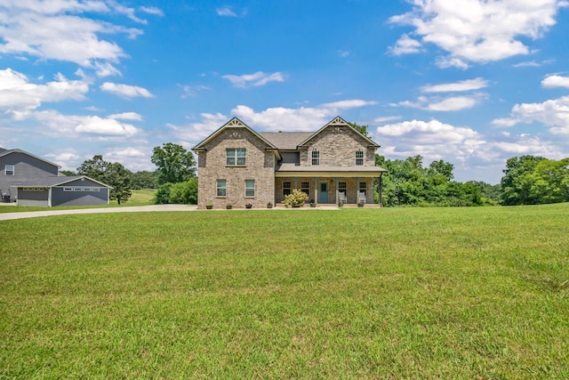 267 Alonzo Pl, Cunningham, TN 37052 - view of front of property featuring a front lawn, brick siding, stone siding, and driveway