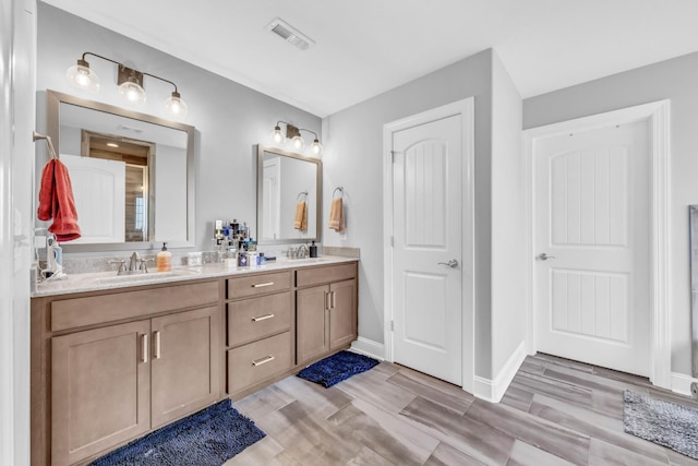 267 Alonzo Pl, Cunningham, TN 37052 - full bath featuring double vanity and wood finished floors