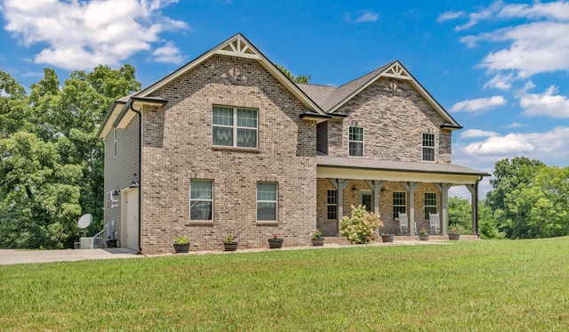 267 Alonzo Pl, Cunningham, TN 37052 - craftsman house featuring covered porch, a front yard, and brick siding