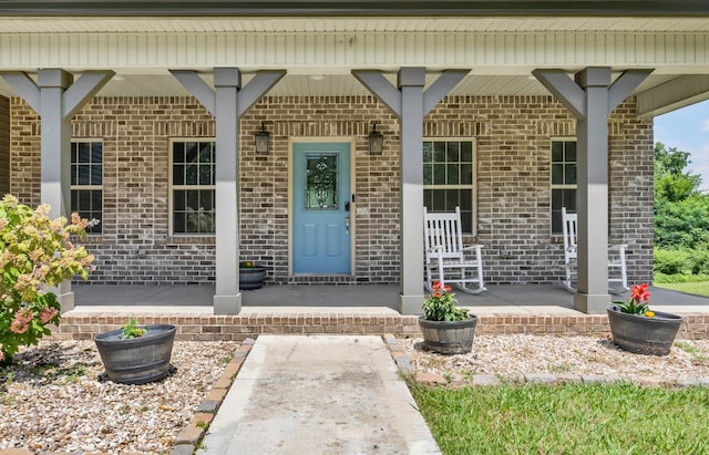 267 Alonzo Pl, Cunningham, TN 37052 - property entrance with covered porch and brick siding