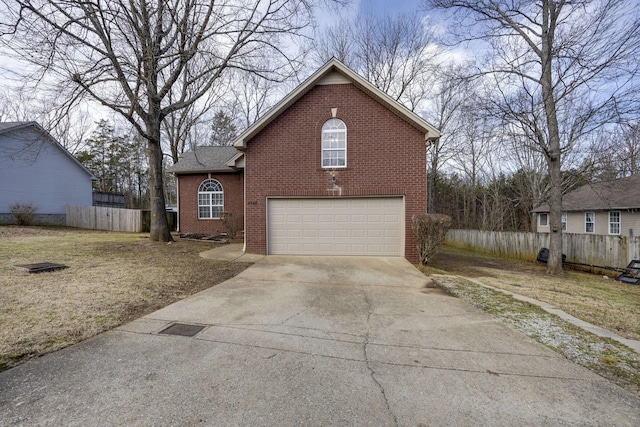 3044 Stone Bridge Rd, Antioch, TN 37013 - view of front of home featuring brick siding, an attached garage, and concrete driveway