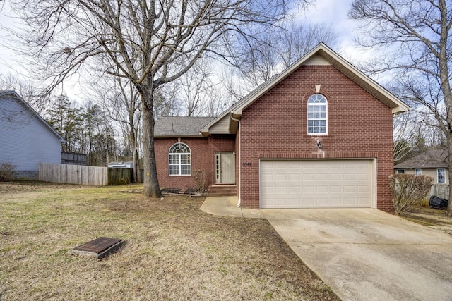 3044 Stone Bridge Rd, Antioch, TN 37013 - traditional home featuring a garage, driveway, and brick siding
