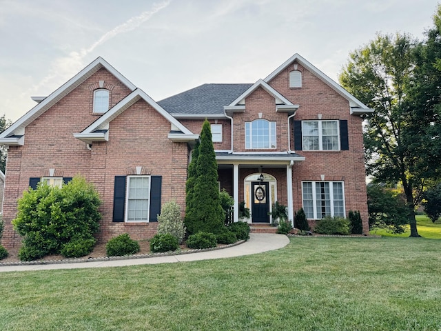 152 Yorkshire Dr, Clarksville, TN 37043 - traditional-style home featuring a front lawn and brick siding