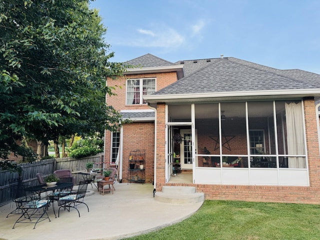 152 Yorkshire Dr, Clarksville, TN 37043 - back of house with roof with shingles, a patio area, a sunroom, and brick siding