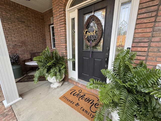 152 Yorkshire Dr, Clarksville, TN 37043 - doorway to property featuring covered porch and brick siding