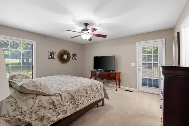 2007 New Castle Rd, Spring Hill, TN 37174 - bedroom featuring access to exterior, multiple windows, light carpet, and ceiling fan