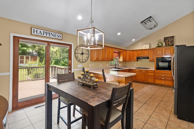 2007 New Castle Rd, Spring Hill, TN 37174 - dining area with vaulted ceiling, light tile patterned flooring, a chandelier, and recessed lighting
