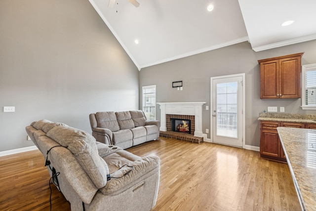 8005 Ragusa Cir, Spring Hill, TN 37174 - living area featuring crown molding, a ceiling fan, healthy amount of natural light, a fireplace, and recessed lighting