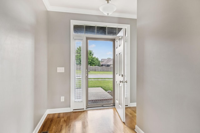 8005 Ragusa Cir, Spring Hill, TN 37174 - foyer entrance with wood finished floors and ornamental molding