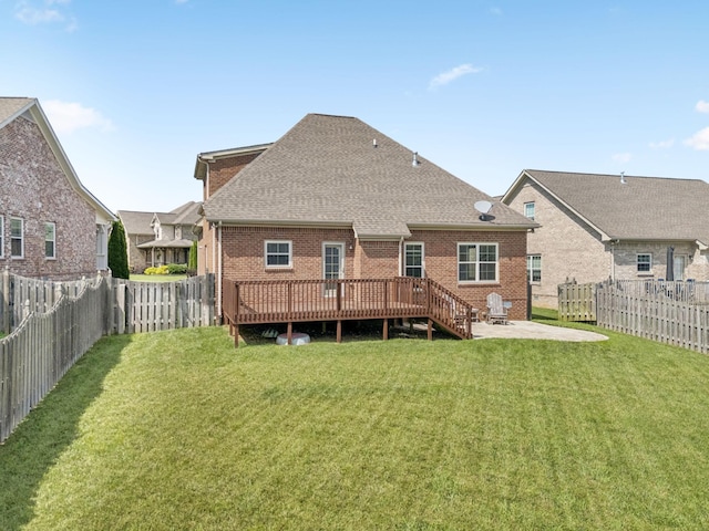8005 Ragusa Cir, Spring Hill, TN 37174 - back of property with a fenced backyard, brick siding, and a patio