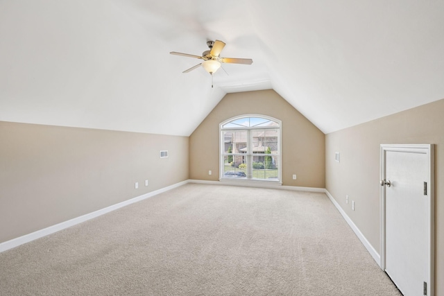 8005 Ragusa Cir, Spring Hill, TN 37174 - additional living space with ceiling fan, lofted ceiling, and light colored carpet