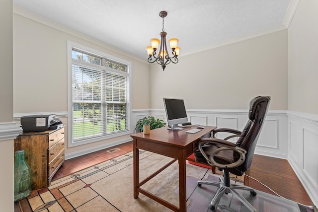 2950 Prince Dr, Clarksville, TN 37043 - office featuring plenty of natural light, a chandelier, a wainscoted wall, light wood finished floors, and crown molding