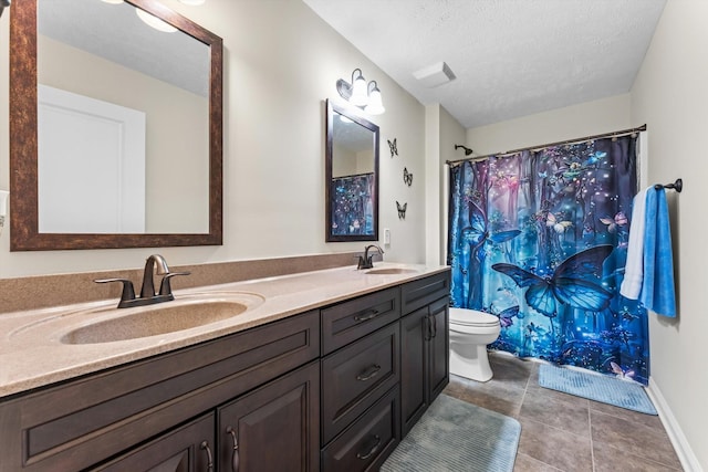 2950 Prince Dr, Clarksville, TN 37043 - bathroom featuring double vanity, tile patterned floors, a textured ceiling, and a shower with curtain