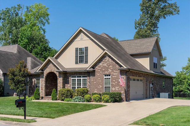 2950 Prince Dr, Clarksville, TN 37043 - view of front of home with concrete driveway, a garage, and brick siding