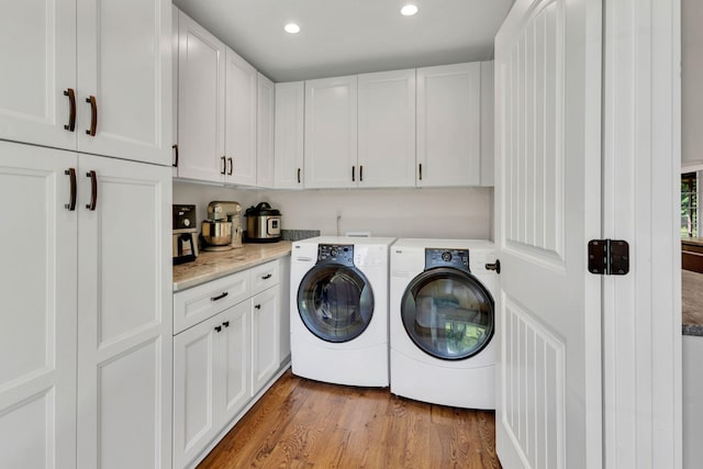 9003 Oden Ct, Brentwood, TN 37027 - laundry room featuring cabinet space, washer and clothes dryer, light wood finished floors, and recessed lighting