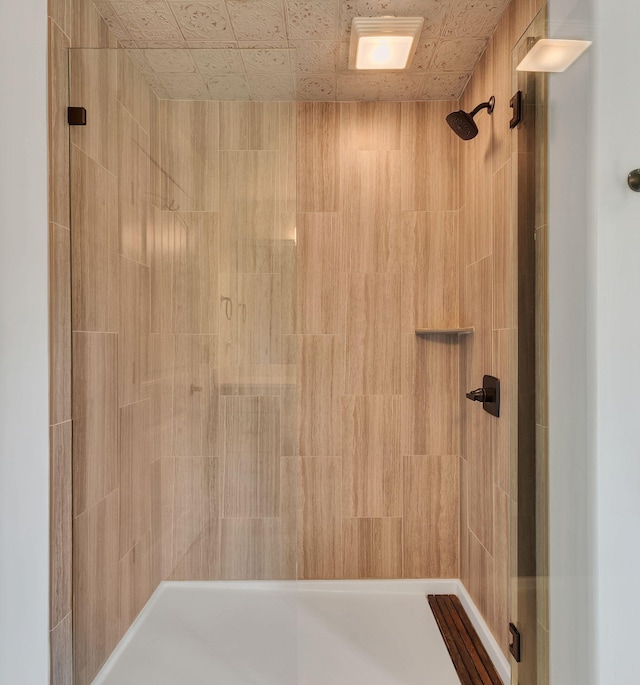 9003 Oden Ct, Brentwood, TN 37027 - bathroom featuring a tile shower