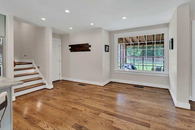 9003 Oden Ct, Brentwood, TN 37027 - foyer entrance featuring wood finished floors, recessed lighting, and stairs