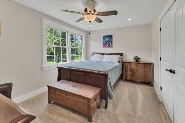 9003 Oden Ct, Brentwood, TN 37027 - bedroom featuring light carpet, ceiling fan, and a closet
