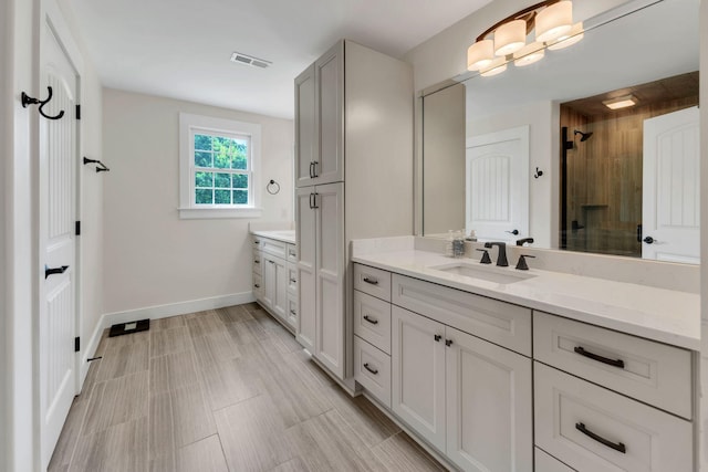 9003 Oden Ct, Brentwood, TN 37027 - bathroom featuring vanity and a tile shower