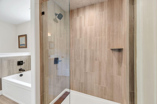9003 Oden Ct, Brentwood, TN 37027 - bathroom featuring tiled shower and a garden tub