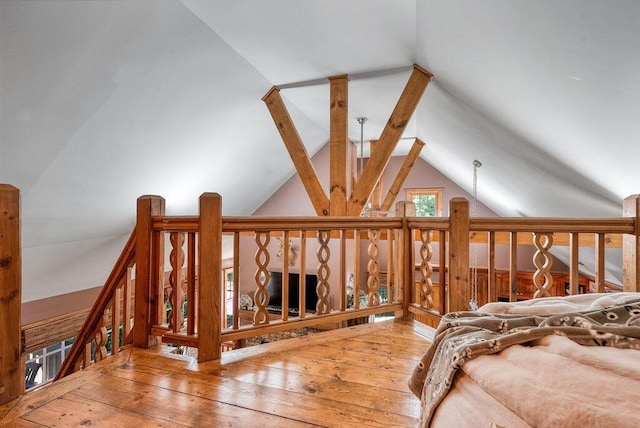 647 Omega Dr, Spring City, TN 37381 - unfurnished bedroom with wood-type flooring and lofted ceiling