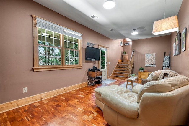647 Omega Dr, Spring City, TN 37381 - living room featuring wood finished floors and stairs