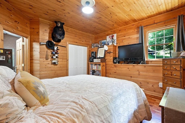 647 Omega Dr, Spring City, TN 37381 - bedroom with wooden walls, wood ceiling, and wood finished floors